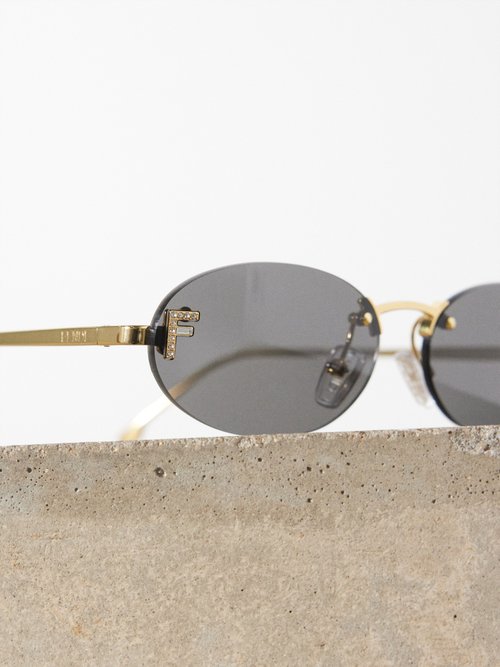 Fendi Eyewear Rimless Round Metal Sunglasses