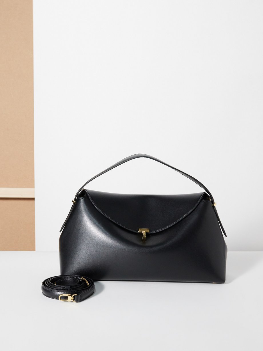 Black T-Lock leather shoulder bag | Toteme | MATCHES UK
