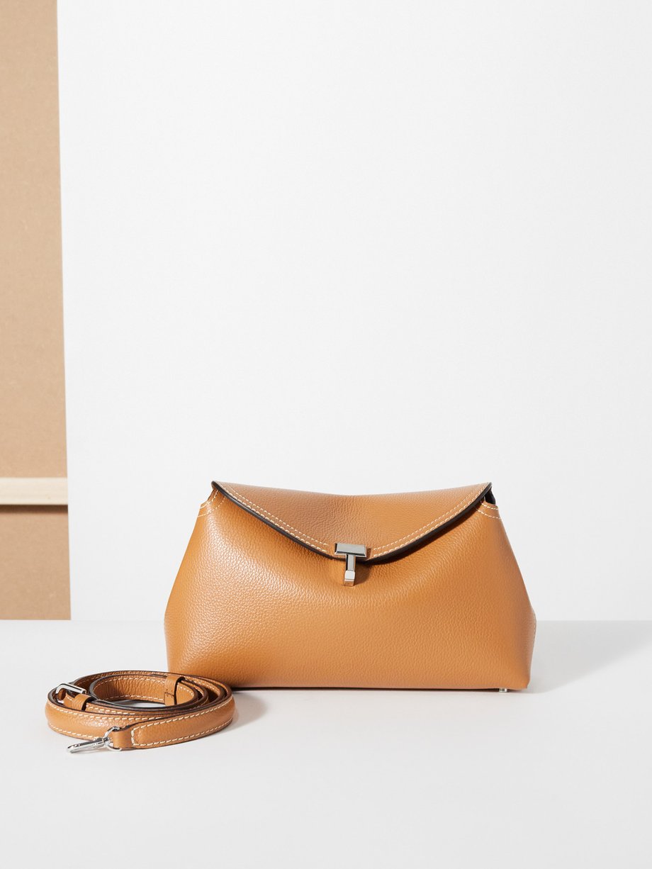 Tan T-Lock small grained-leather cross-body bag, Toteme