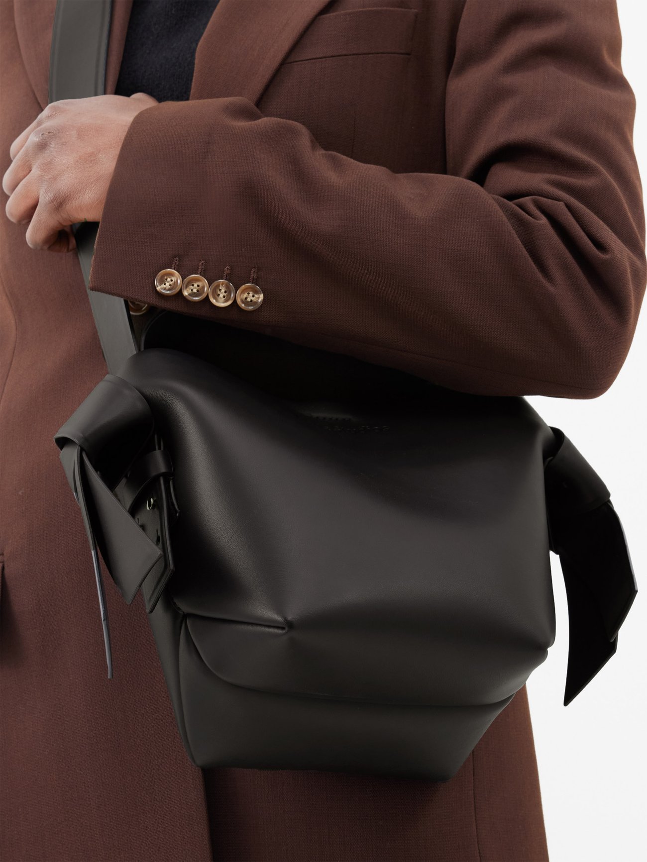 Black Musubi mini leather cross-body bag | Acne Studios | MATCHES UK