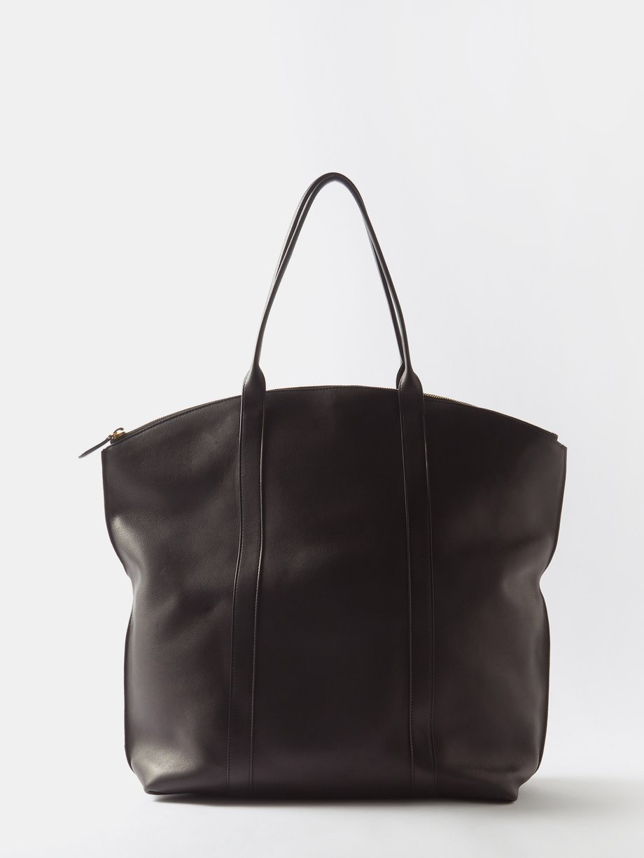 Black Curved-top leather tote bag | The Row | MATCHESFASHION UK