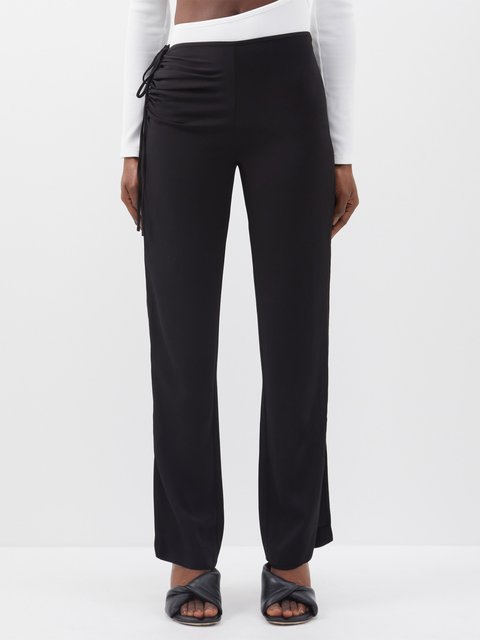 Black High Waisted Ruched Bum Jersey Flared Trousers | boohoo