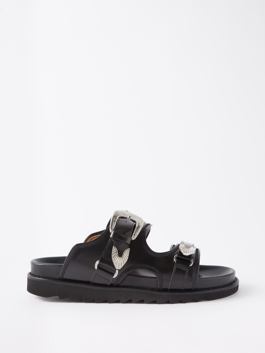Black Concho-embellished leather sandals | Toga Virilis 