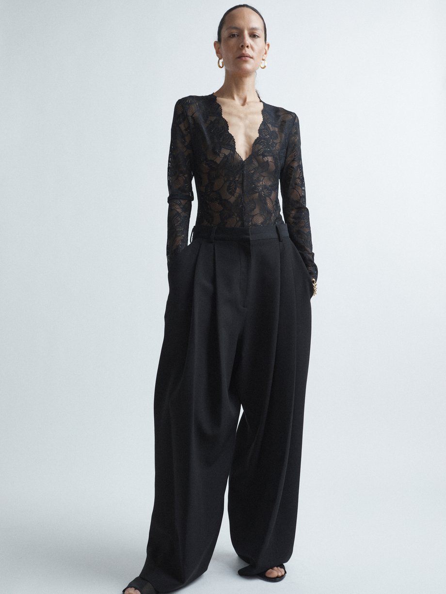 Black Giant pleat-front suit trousers | Raey | MATCHES UK
