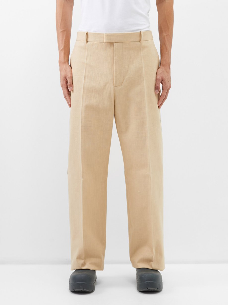 Camel Pleated cotton-canvas suit trousers | Bottega Veneta | MATCHES UK