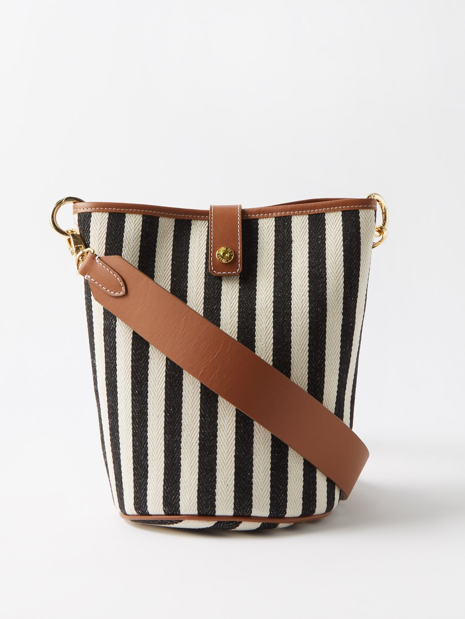 Black Palais Royal striped canvas bucket bag | Rue De Verneuil ...