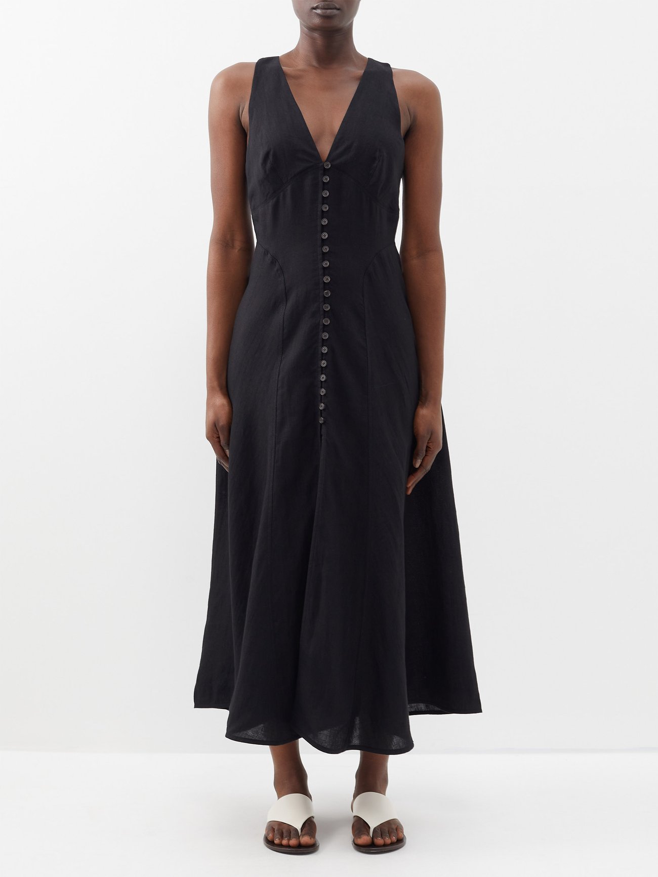 Black summer dresses are the versatile and easy way to get dressed on hot summer days! Pared-back elegance is Three Graces London's calling card, as evidenced in the clean and understated lines of this black linen Rose dress.