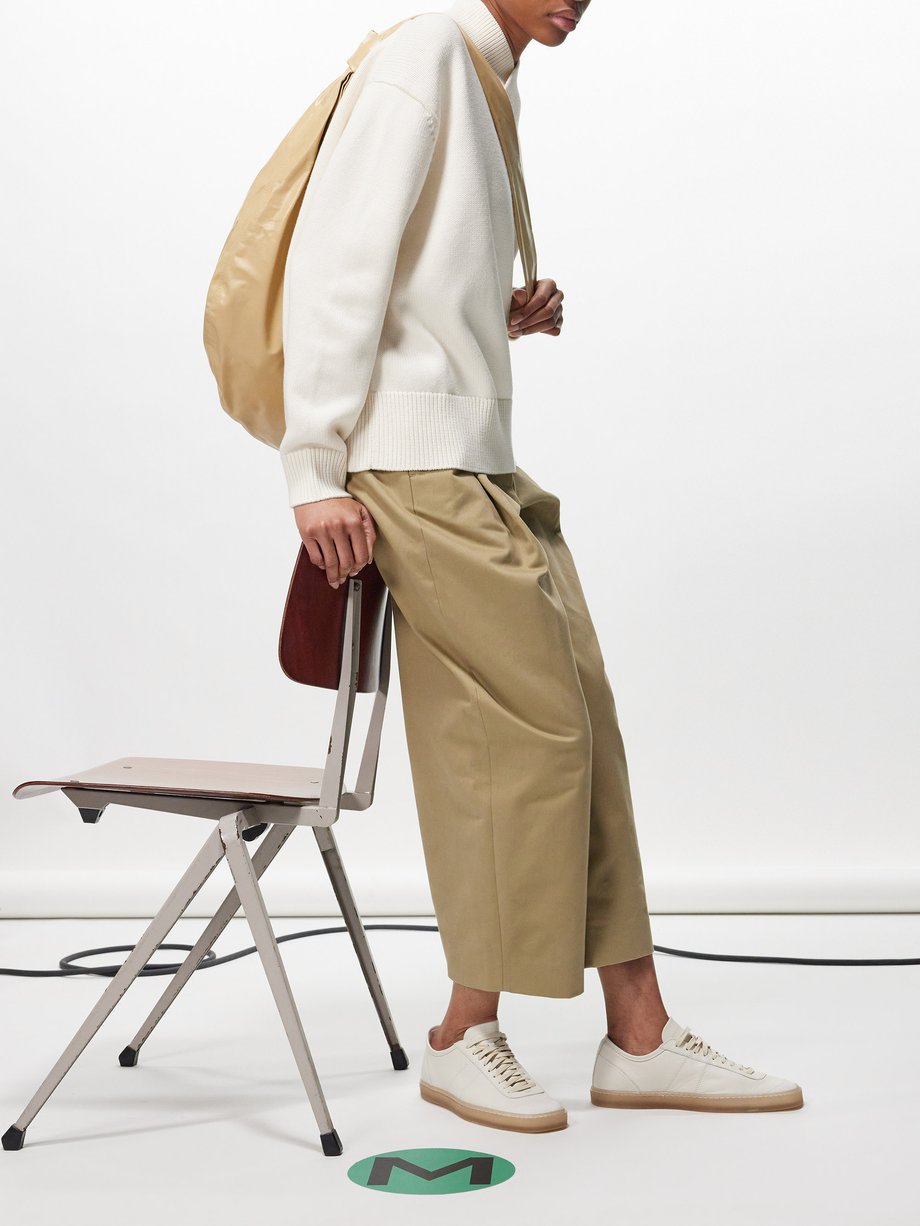 Tan Dordoni pleated cotton-twill trousers | Studio Nicholson 