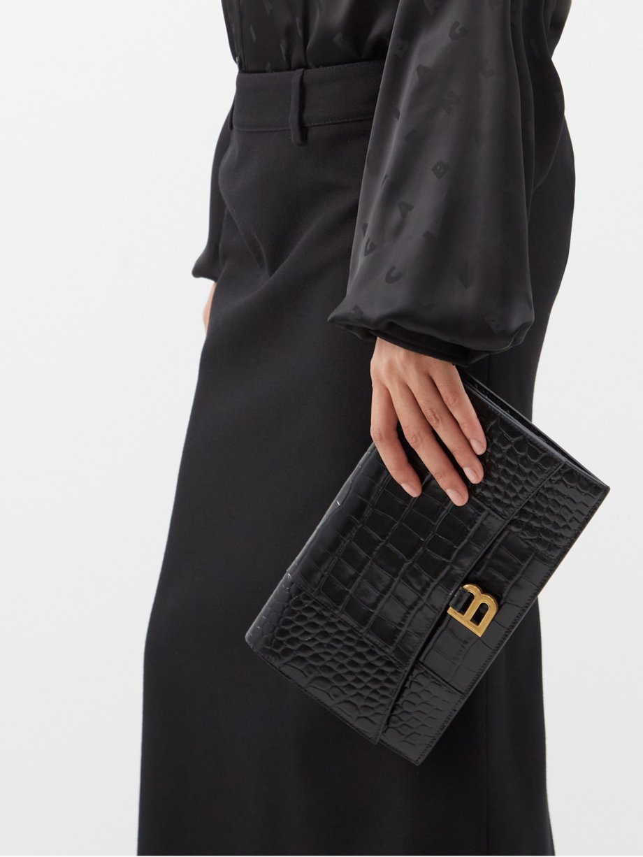 Derfor underjordisk Afdæk Black Hourglass crocodile-effect leather clutch bag | Balenciaga |  MATCHESFASHION US