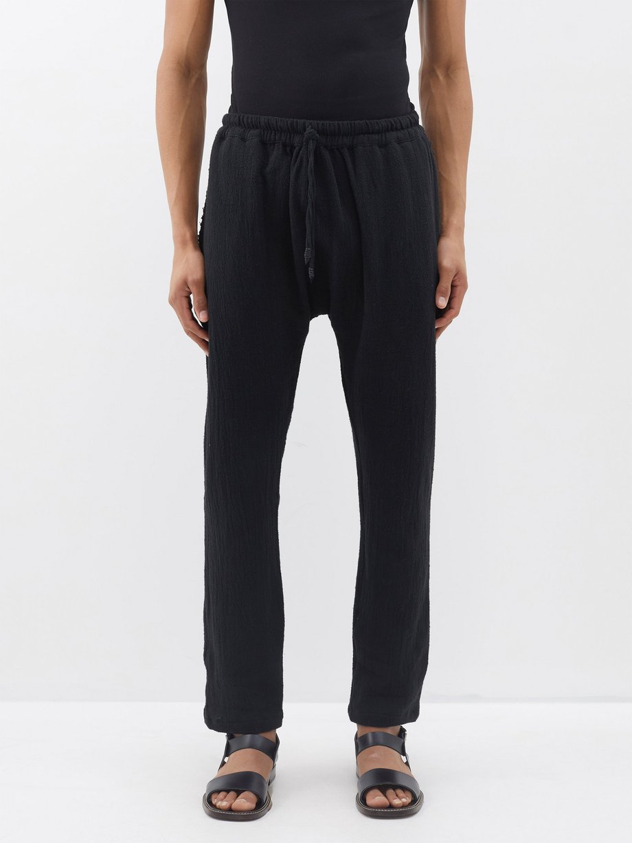 Black Wakun drawstring cotton-gauze trousers | CARAVANA | MATCHESFASHION AU