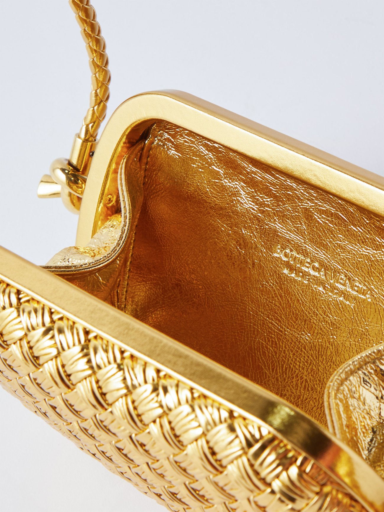 Gold Knot Intrecciato metallic-leather clutch bag, Bottega Veneta