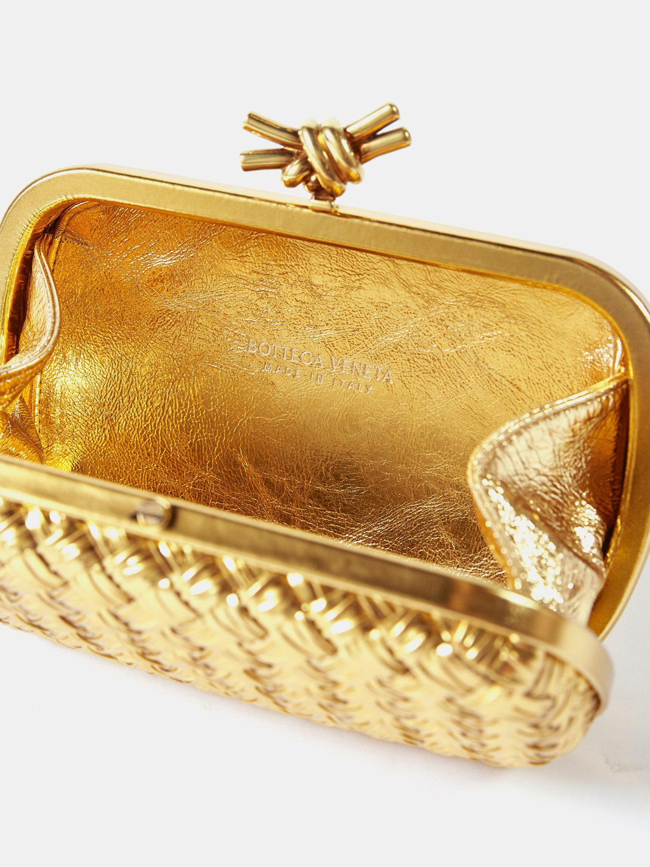 BOTTEGA VENETA, Minaudiere 'Knot In gold-plated metal 'I…