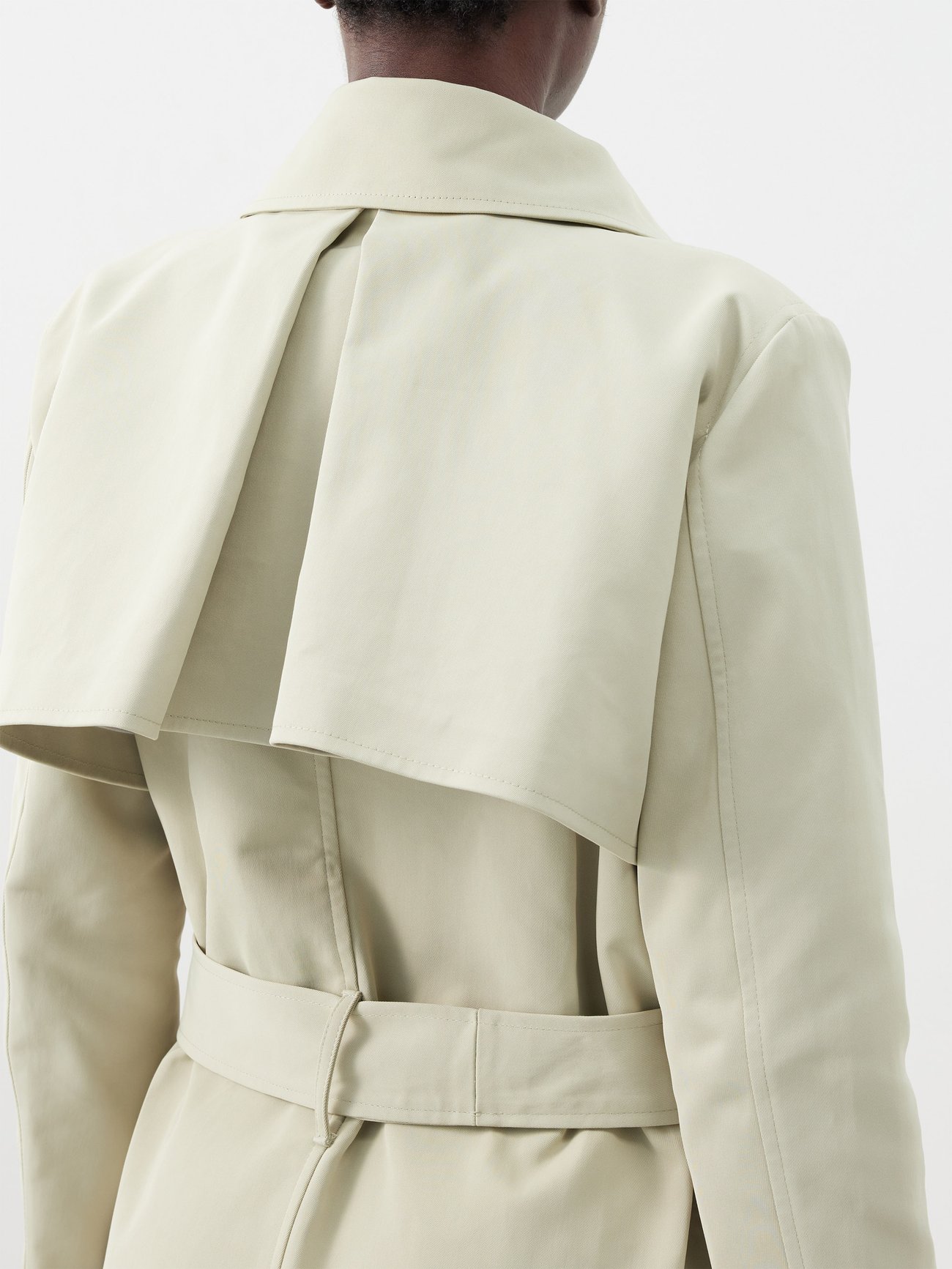 Asymmetric draped twill trench coat