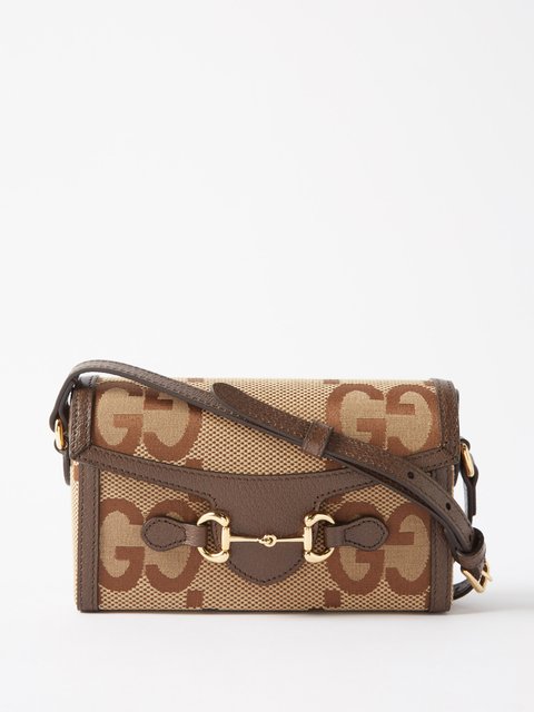 Beige GG logo leather trimmed cross body bag Gucci MATCHES UK