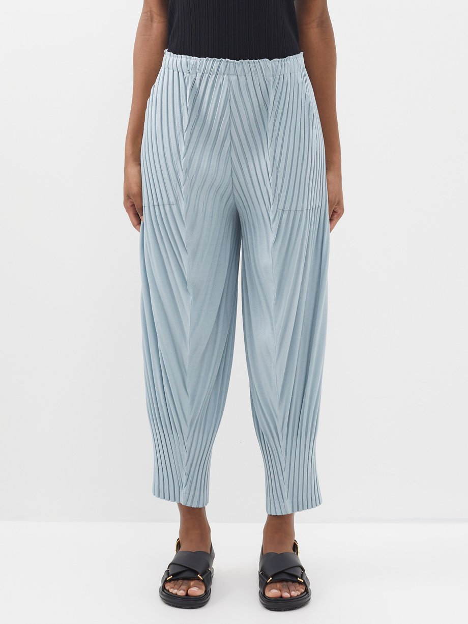 Blue Tapered technical-pleated trousers | Issey Miyake | MATCHESFASHION UK