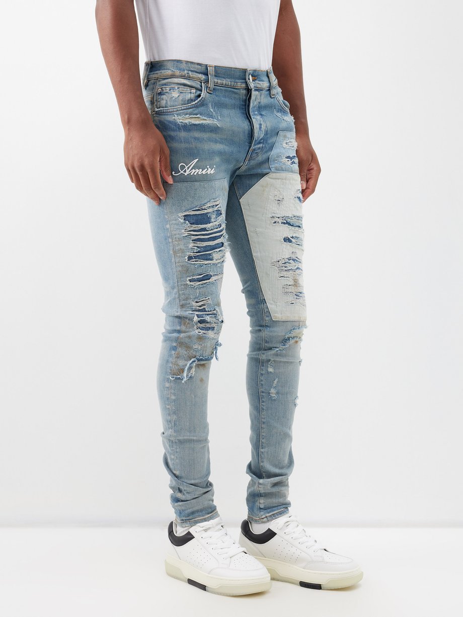 Blue Artisanal distressed slim-leg jeans | Amiri | MATCHES UK