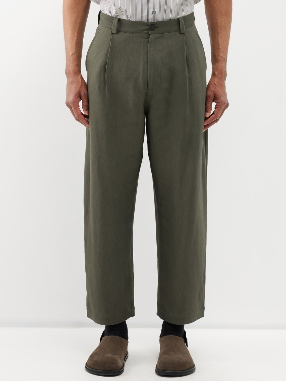 Green Tuck pleated twill trousers | Studio Nicholson | MATCHESFASHION UK