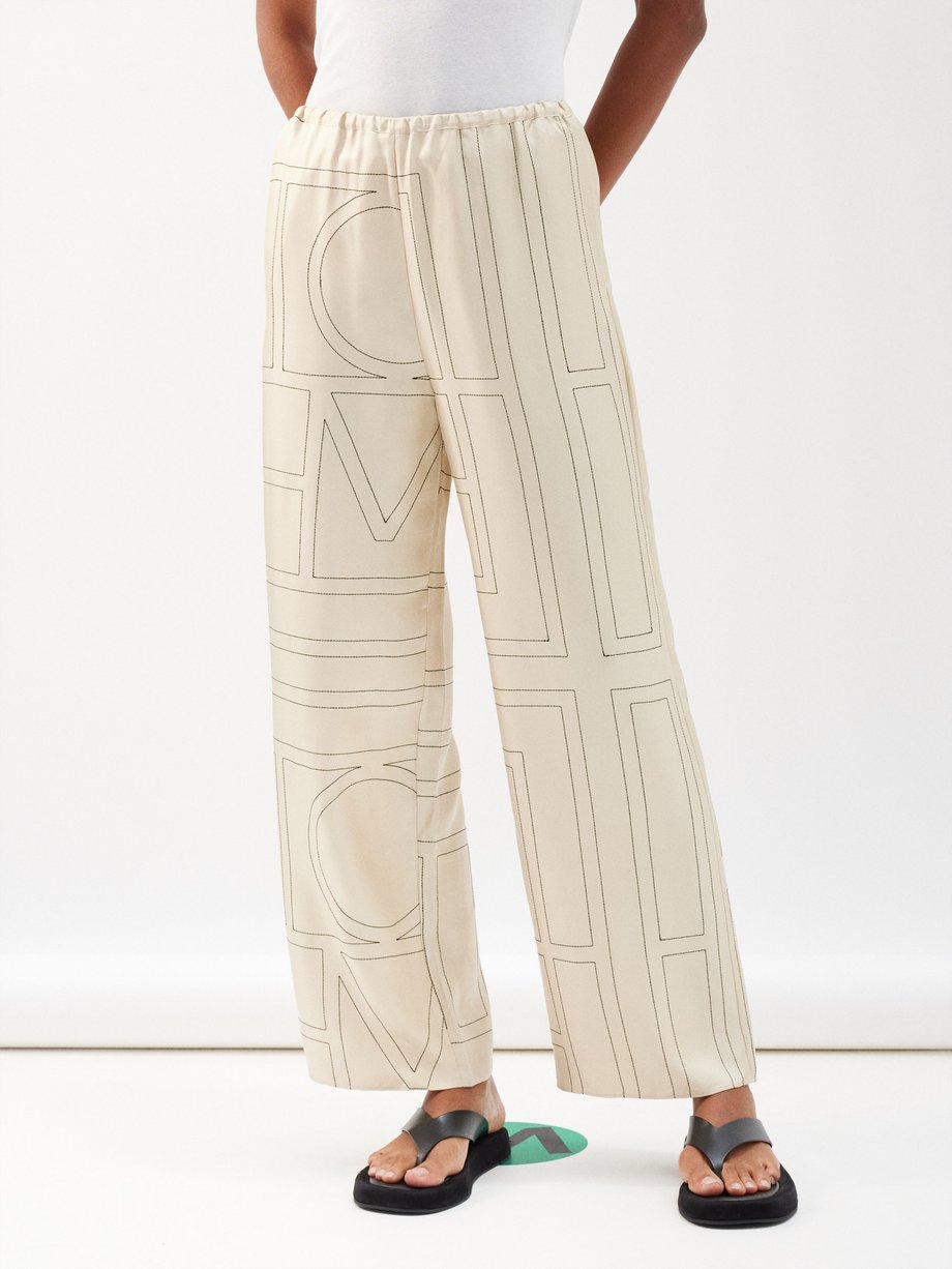 White Monogram-embroidered silk-twill pyjama trousers | Toteme | MATCHES UK