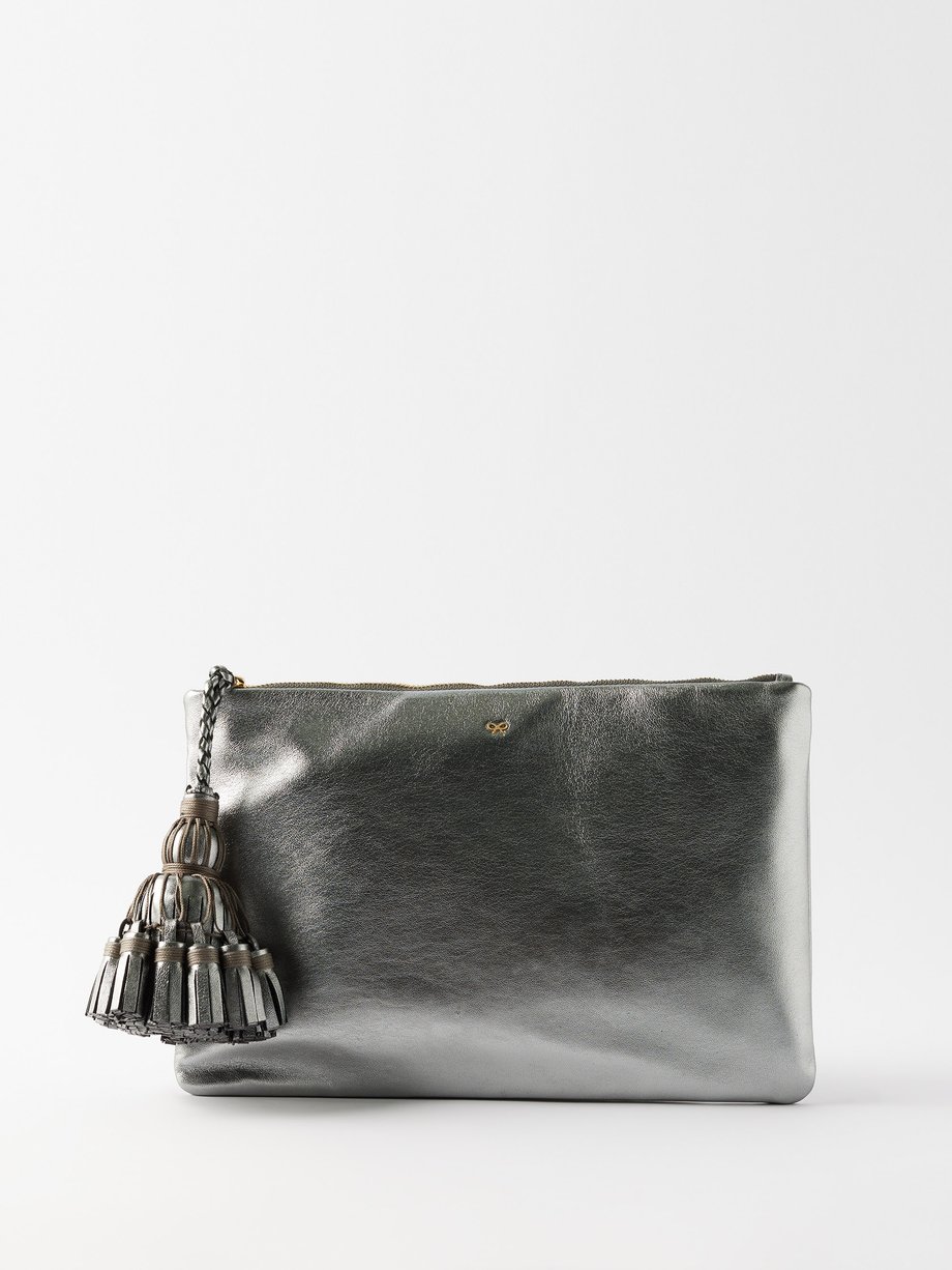 Silver Georgiana tasselled metallic leather clutch bag Anya