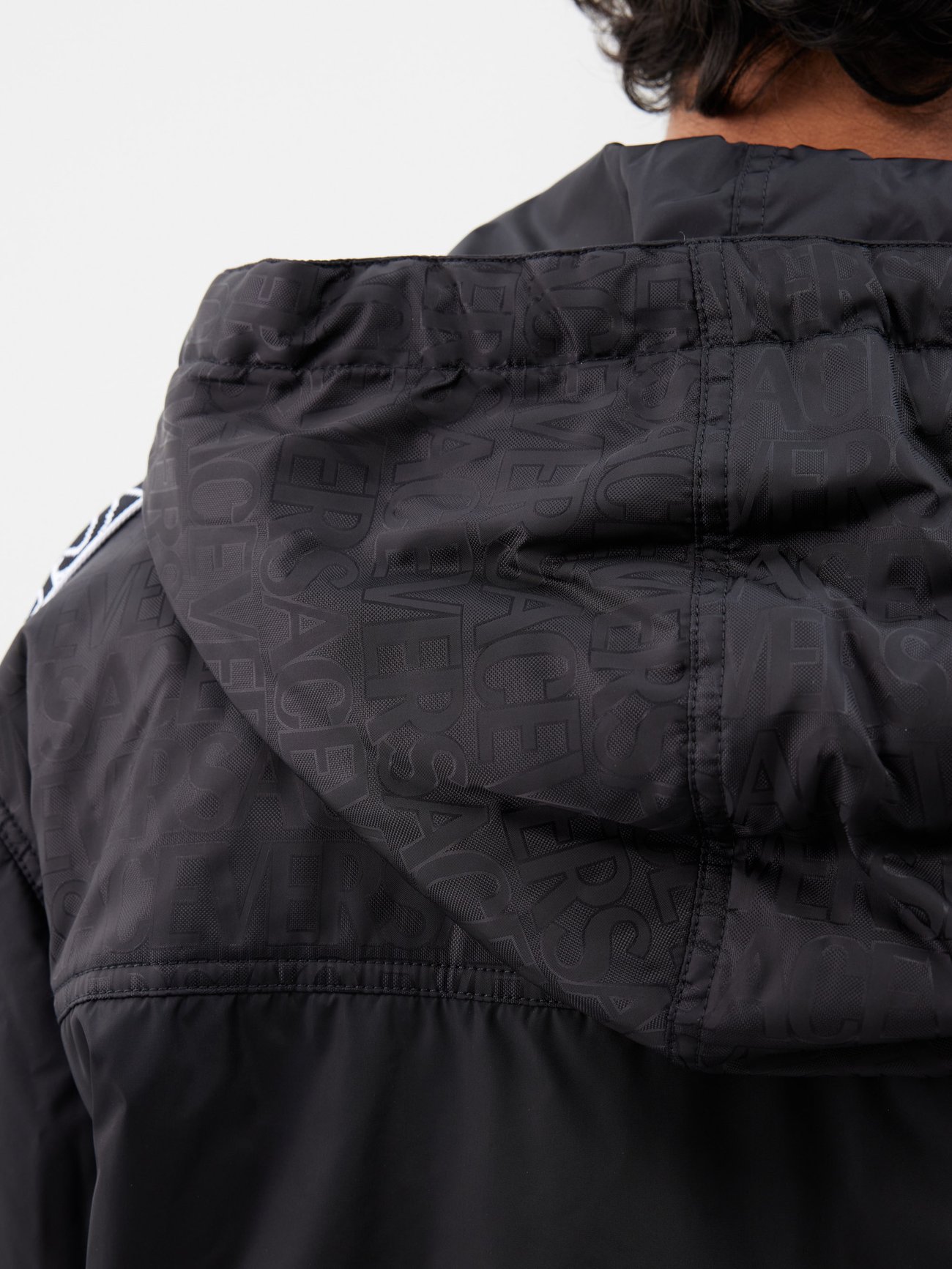 Black Logo-jacquard nylon hooded jacket, Versace