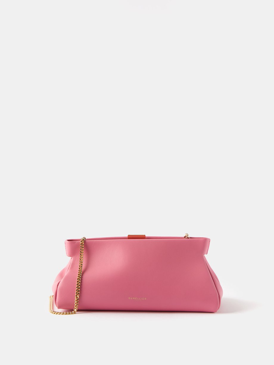 Pink Cannes leather clutch bag | DeMellier | MATCHESFASHION UK
