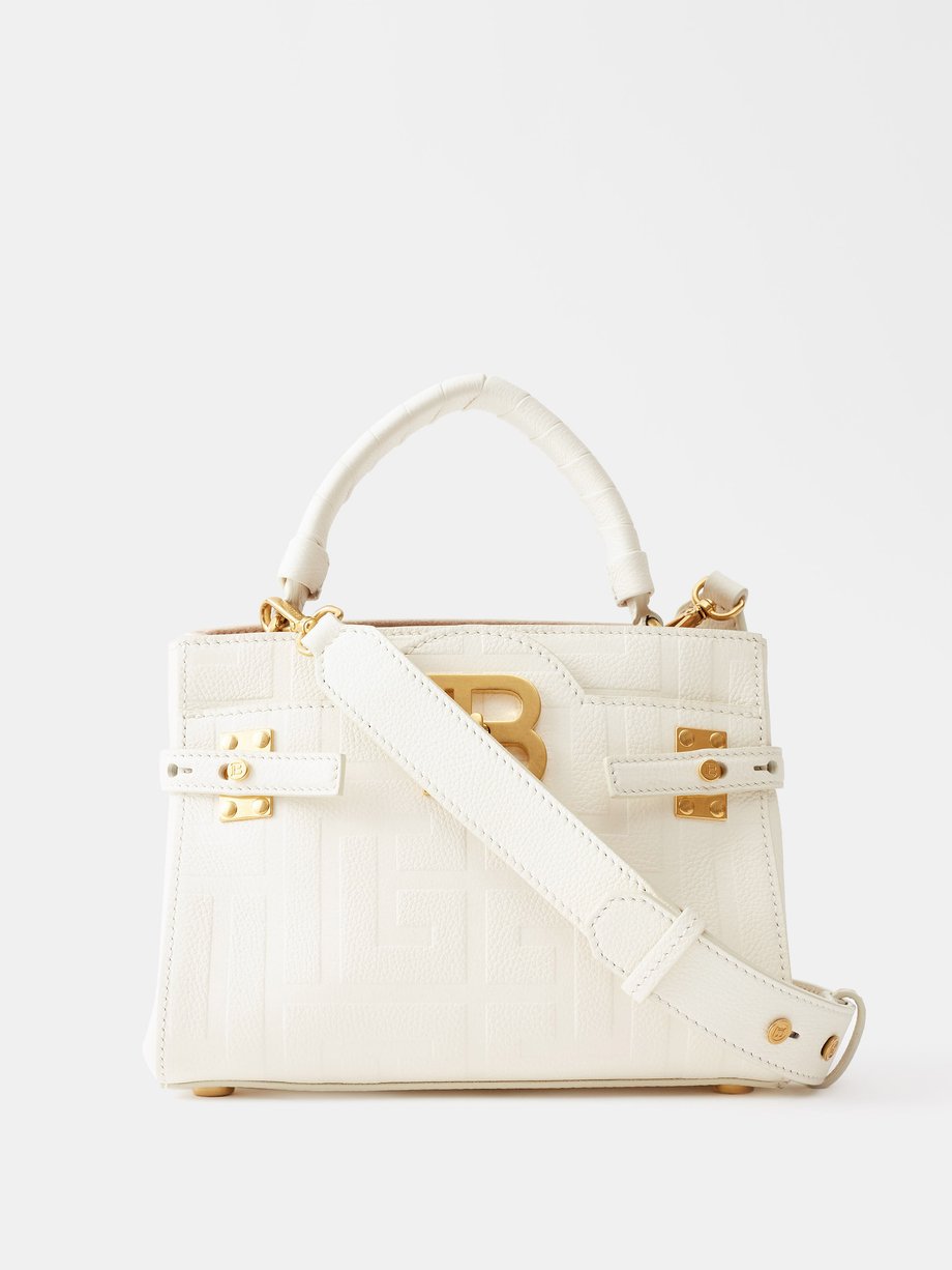 White BBuzz logo-embossed leather handbag | Balmain | MATCHESFASHION US