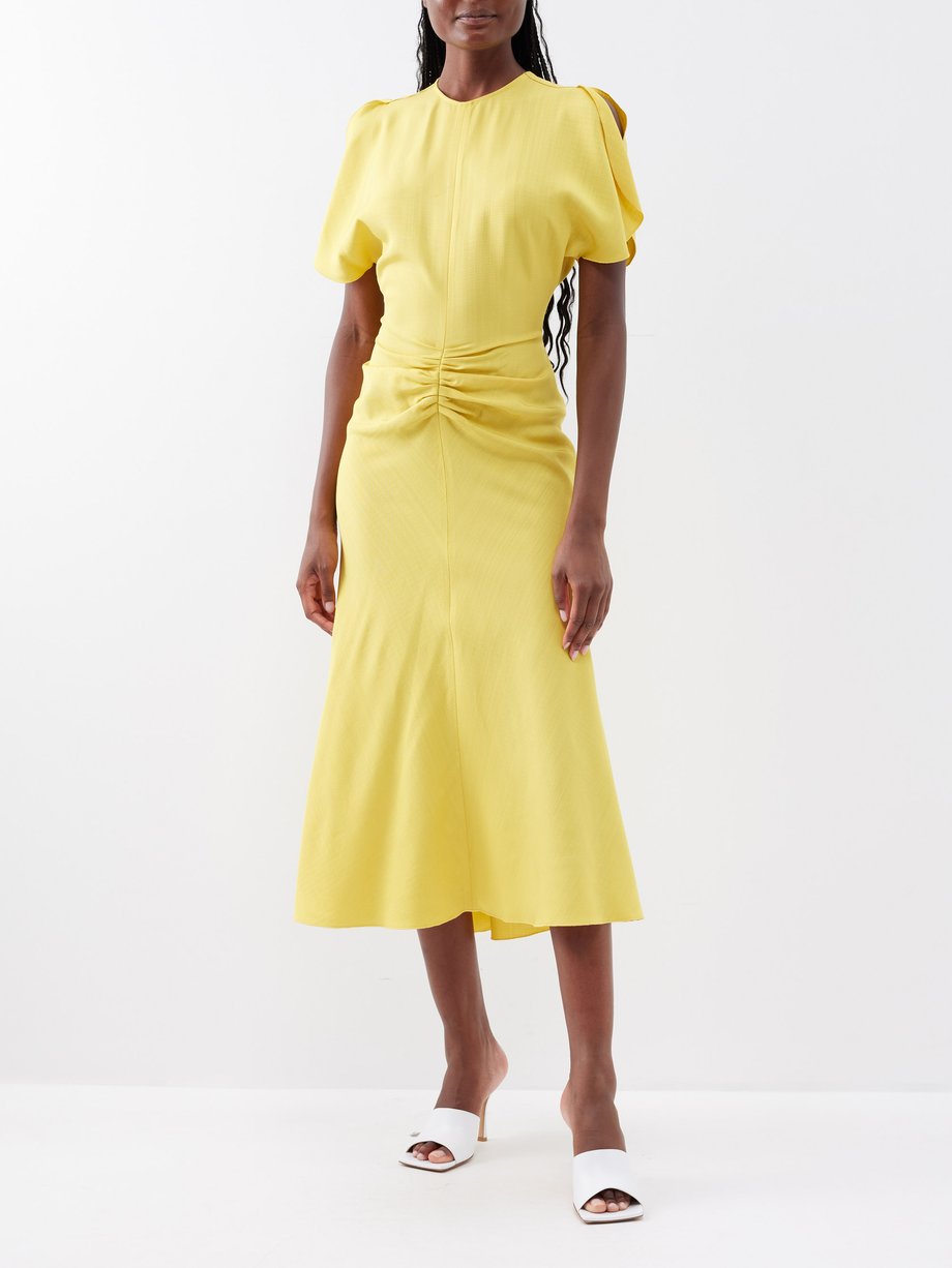 Yellow Ruched canvas midi dress | Victoria Beckham | MATCHESFASHION US