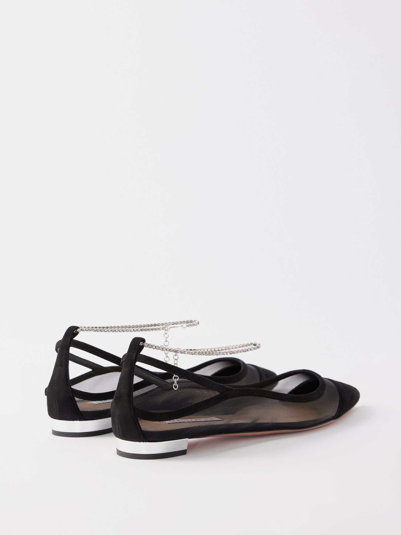 Aquazzura's black Secret Affair flats are made in Florence from sheer mesh outlined with suede at the point toe and secured with a crystal-bracelet ankle strap.