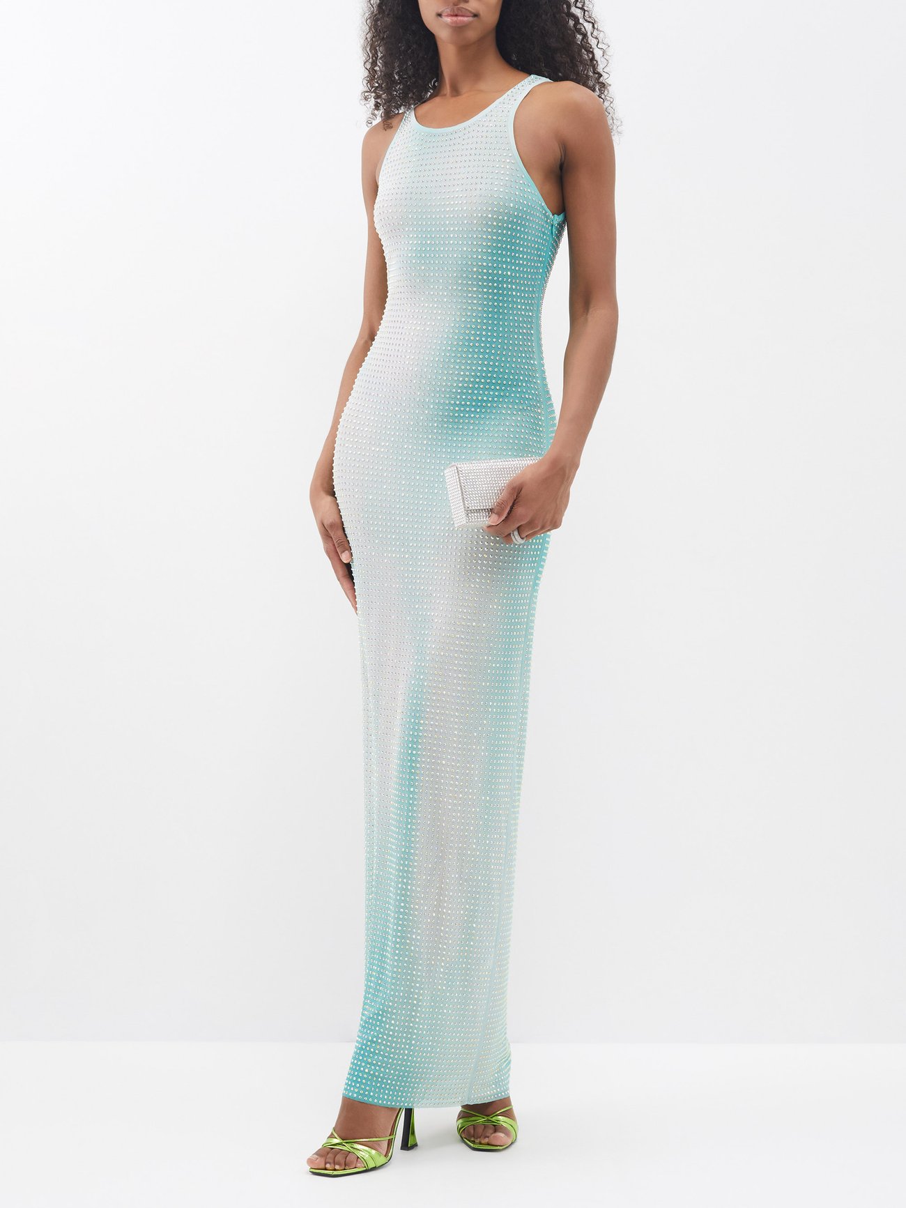 Han Chong muses on high summer for Pre-AW23 evidenced by this shimmering green maxi dress, made from gradient mesh faceted with hundreds of crystals.