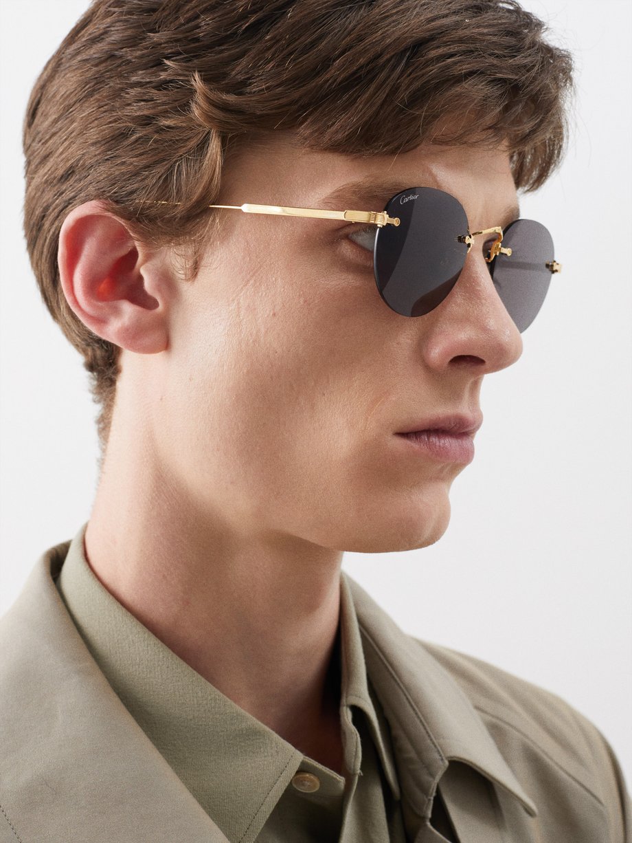Gold Signature round metal sunglasses | Cartier Eyewear | MATCHES UK