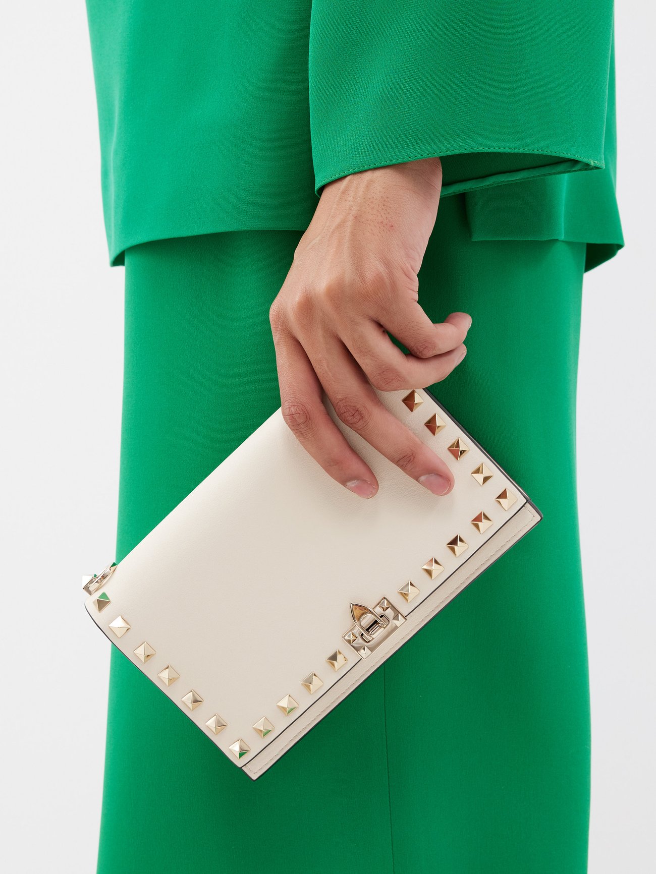 Click here to buy Valentino Rockstud camera leather cross-body bag at  MATCHESFASHION.COM in 2023