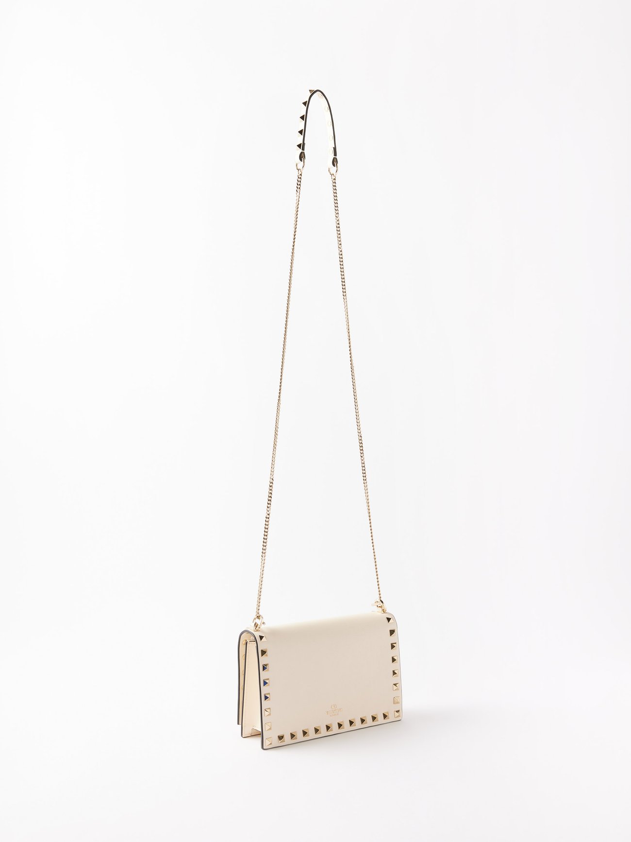 Click here to buy Valentino Rockstud camera leather cross-body bag at  MATCHESFASHION.COM in 2023