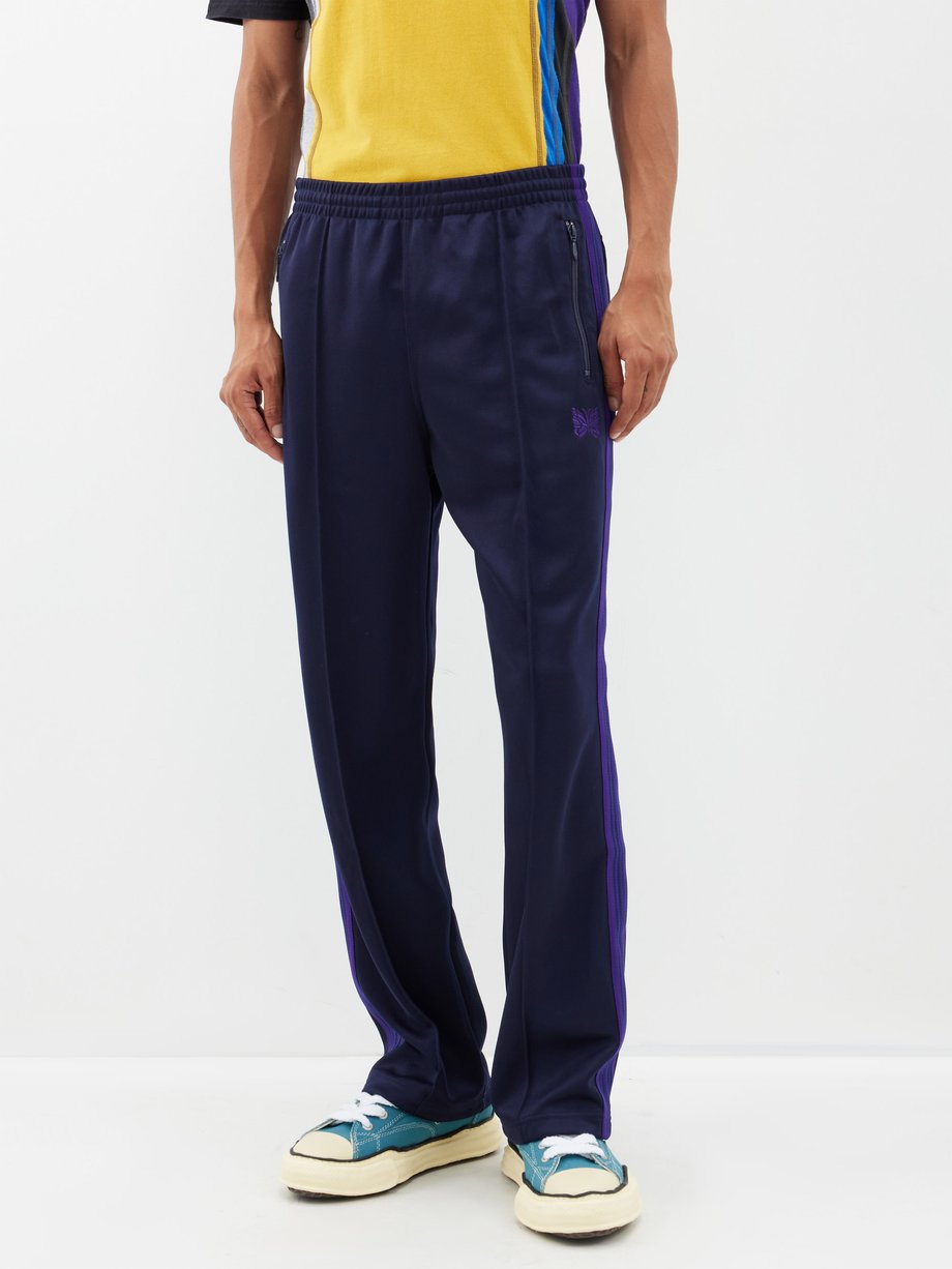 Navy Butterfly-embroidered jersey track pants | Needles