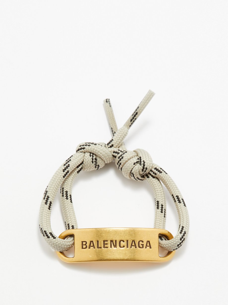 Gold Logo-plaque corded bracelet | Balenciaga | MATCHESFASHION US