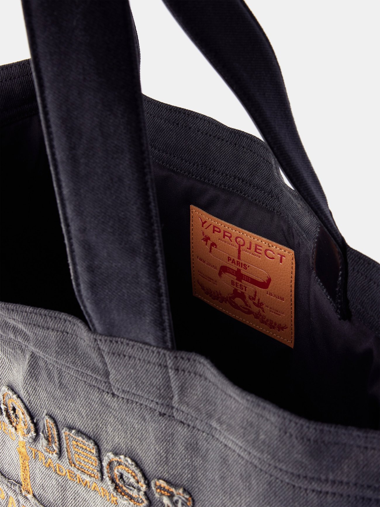 Black Paris' Best distressed-denim tote bag | Y/Project