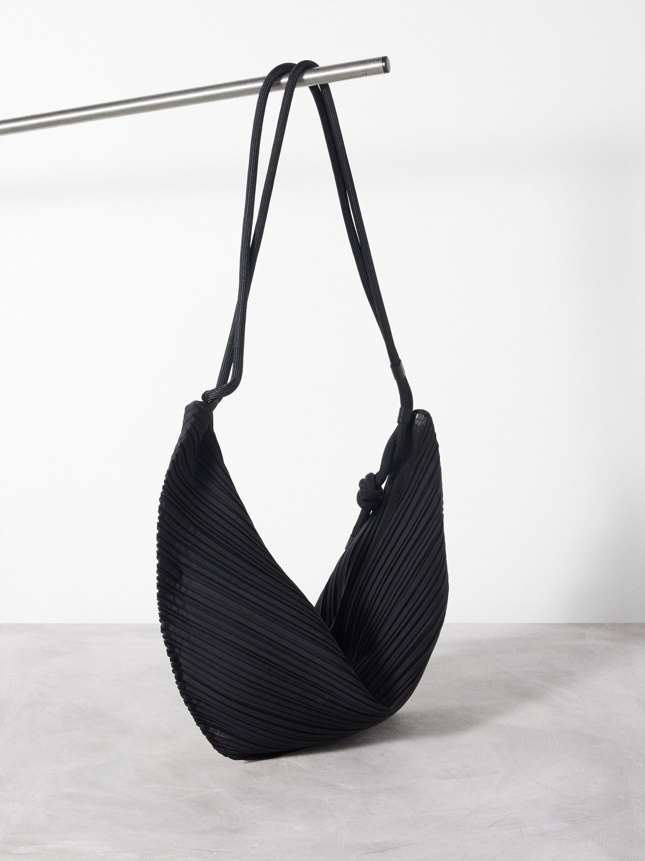 Black Leaf large technical-pleated cross-body bag, Pleats Please Issey  Miyake