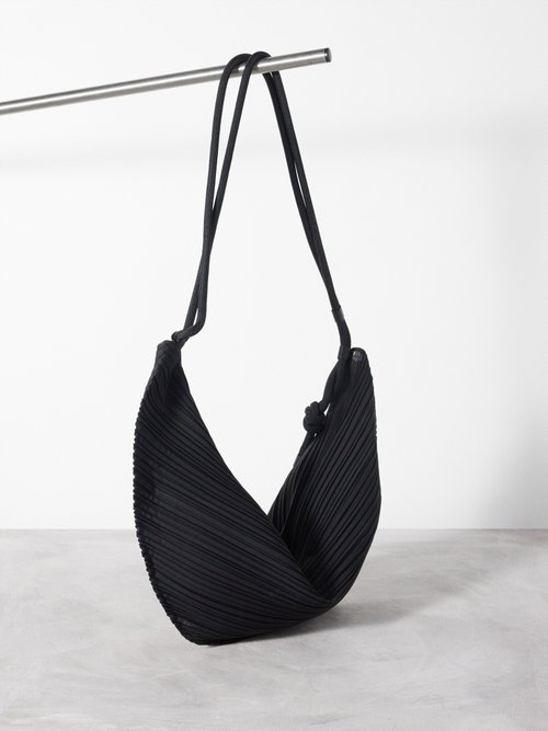 Leaf Bias Technical-pleated Crescent Bag In Black