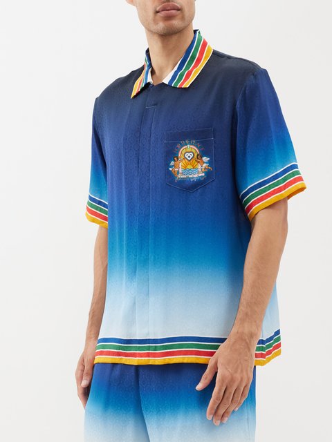 Blue For The Peace-print silk polo shirt | Casablanca | MATCHES UK