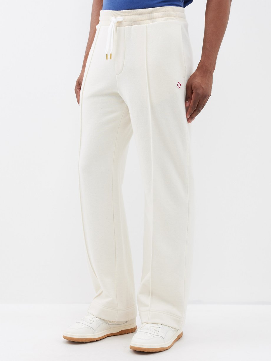 Neutral Logo-embroidered cashmere-blend track pants | Casablanca ...
