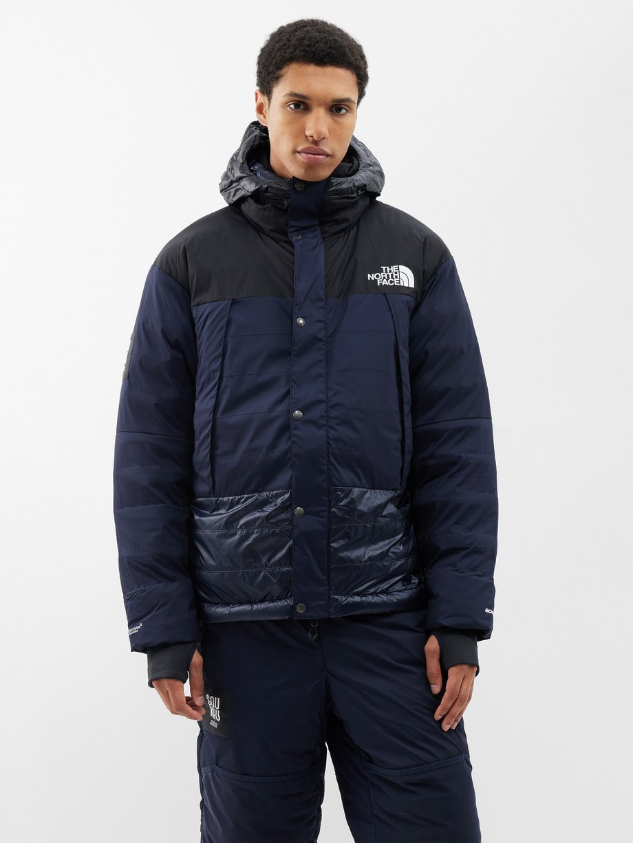 Navy Mountain quilted coat | The North Face x Undercover | MATCHES UK