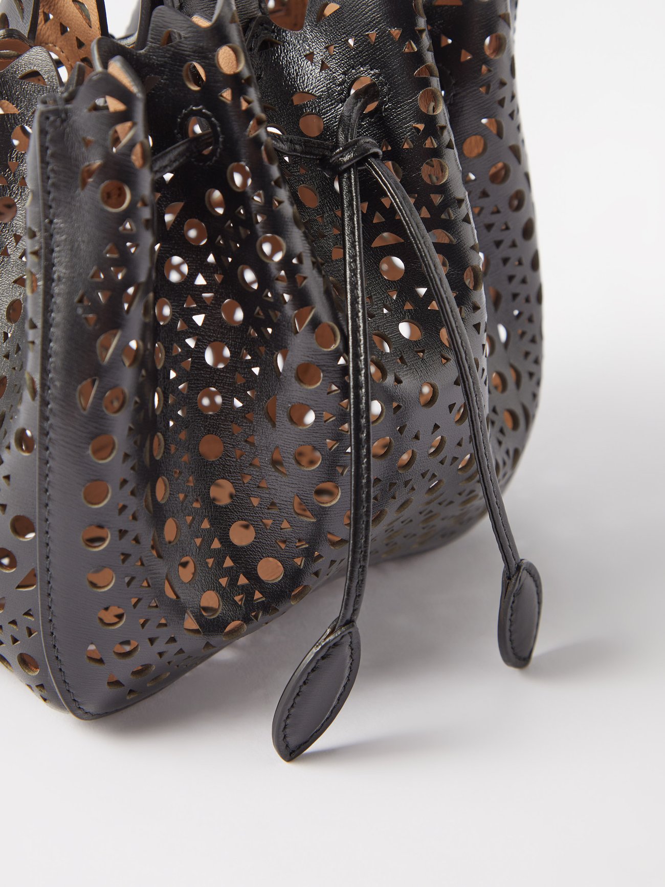 ALAÏA Rose Marie pearl-embellished leather bucket bag