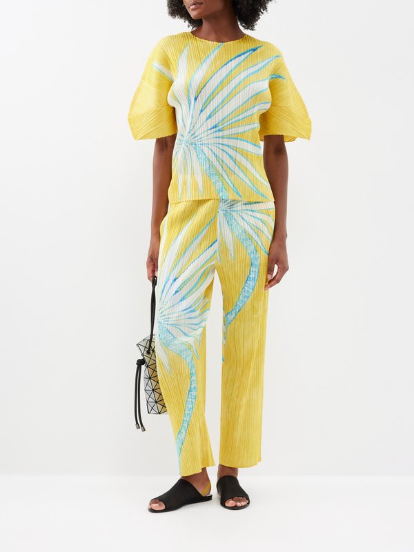 Yellow Palm tree-print technical-pleated trousers | Pleats