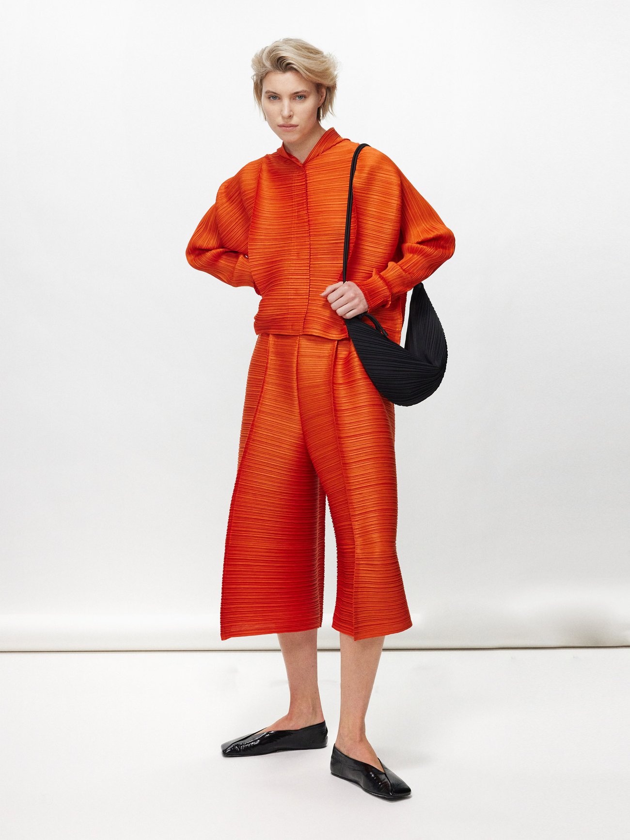 Orange Technical-pleated wide-leg trousers | Pleats Please Issey 