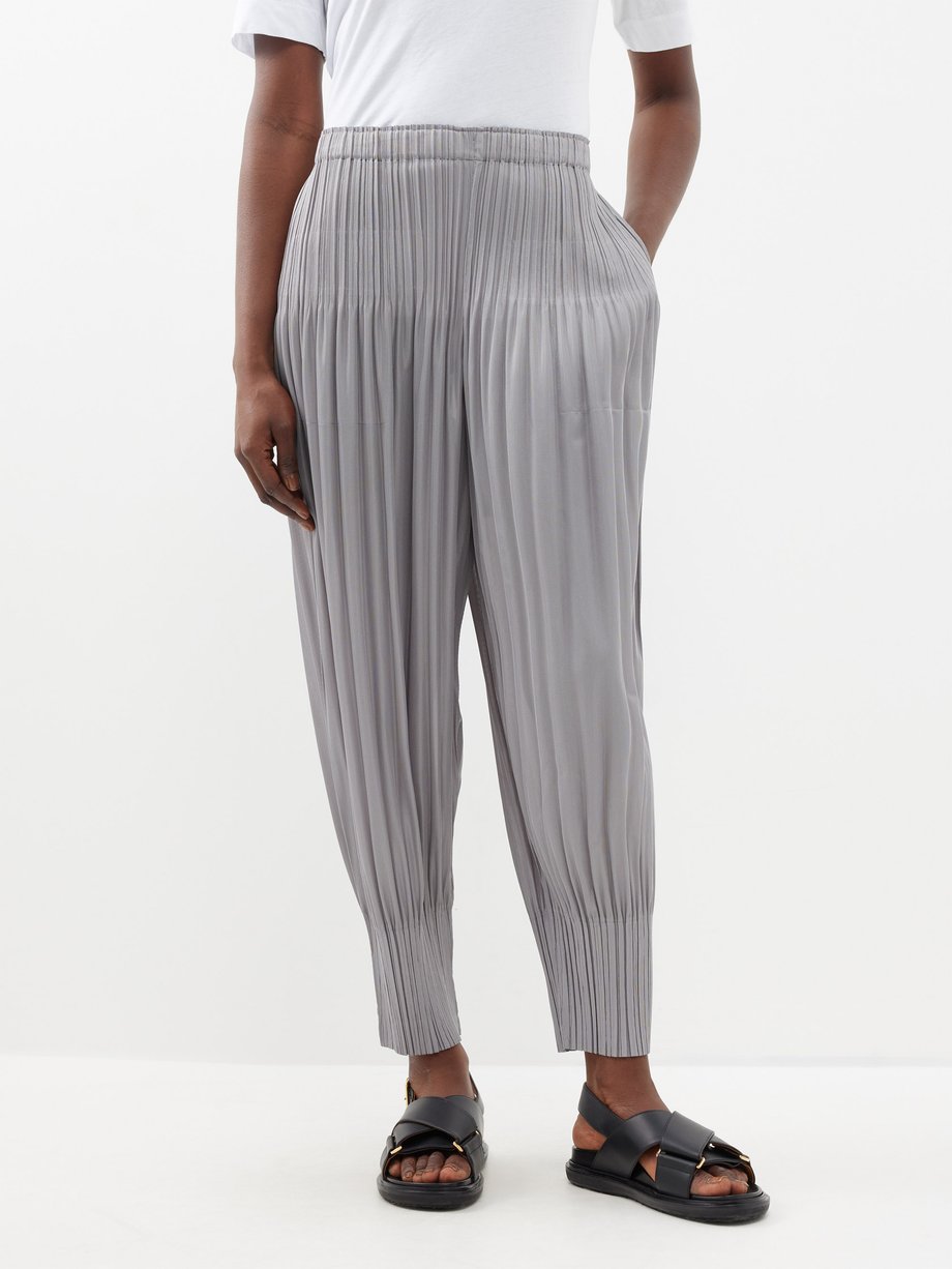 Grey Tapered technical-pleated trousers | Pleats Please Issey 