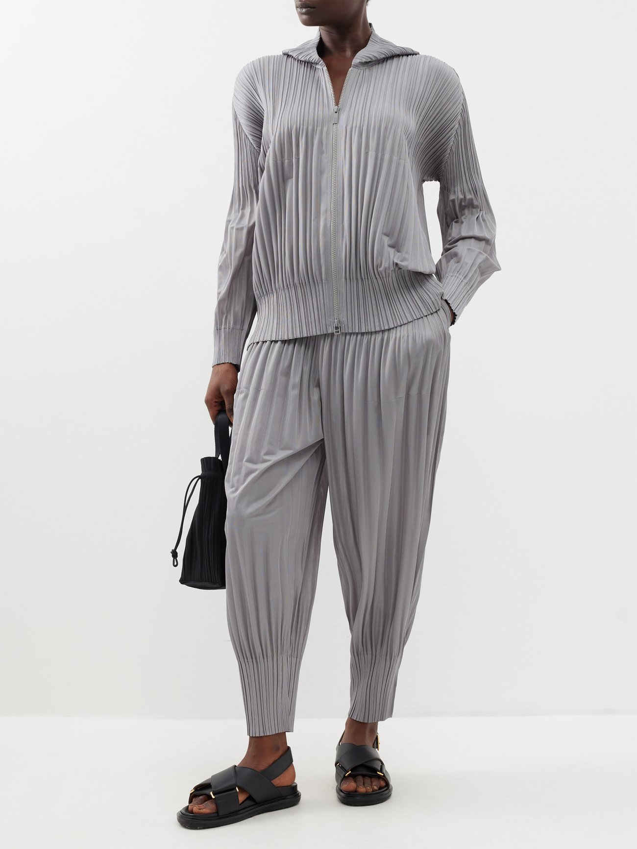 Tapered technical-pleated trousers