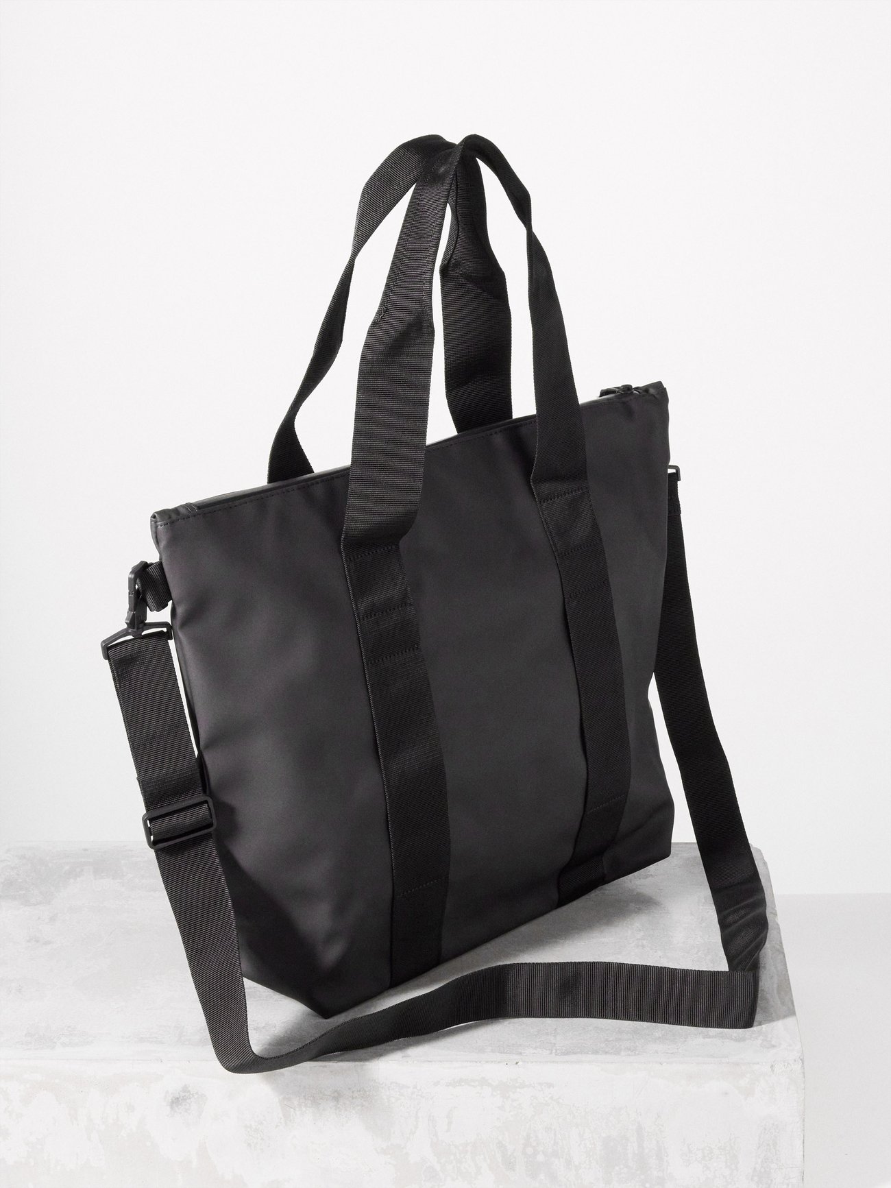 Rains® Tote Bag Mini in Black for $95