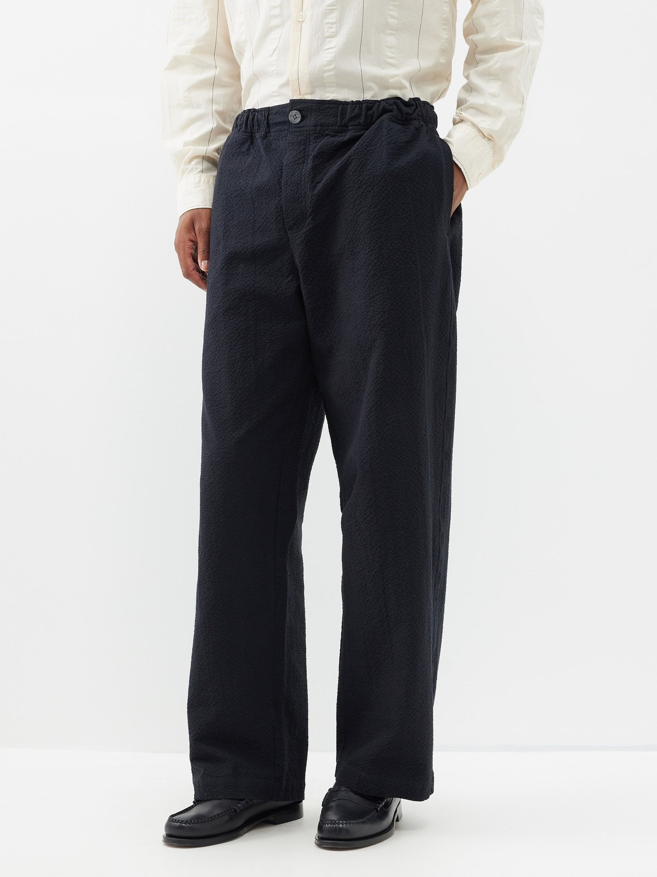 Black Easy cotton-seersucker relaxed-leg trousers | mfpen