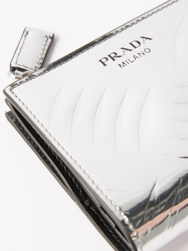 Prada Embossed leather bi-fold wallet