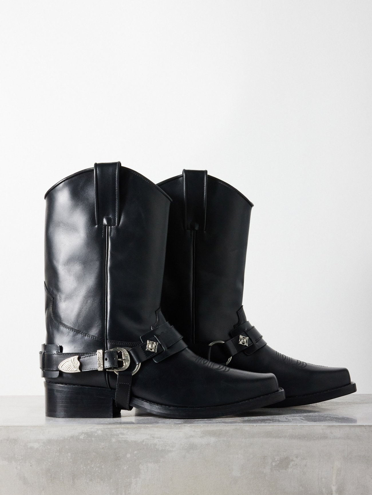 Harness concho-embellished leather boots