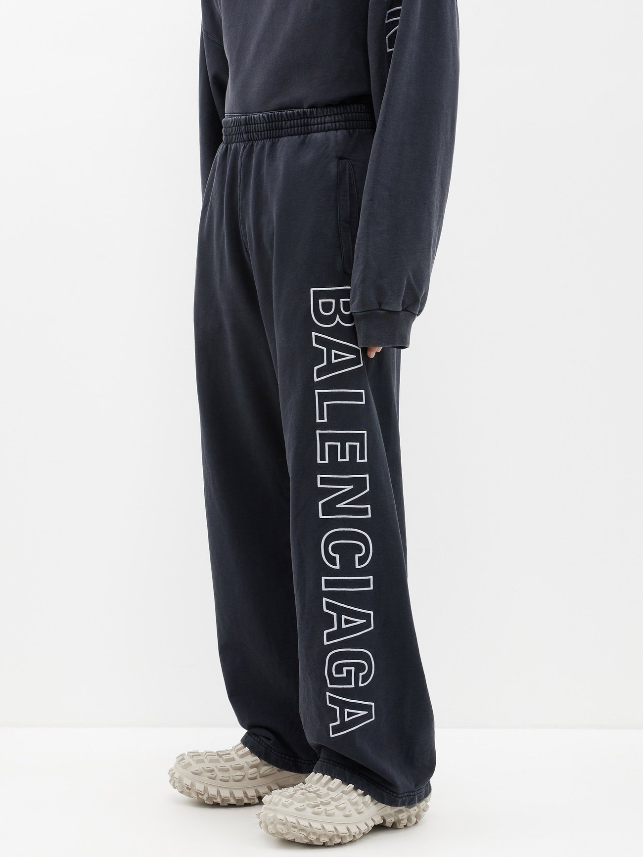 Black Logo-print baggy cotton-jersey track pants | Balenciaga | MATCHES UK